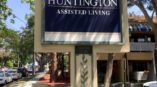 Outdoor sign for The Huntington Assisted Living