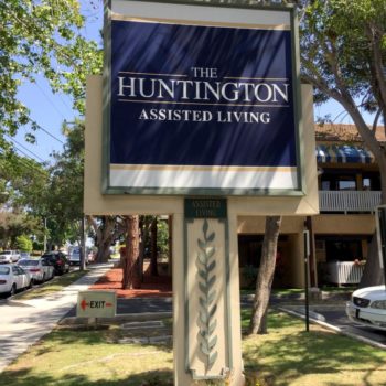 Outdoor sign for The Huntington Assisted Living