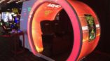 A VR experience pod wrapped with branding