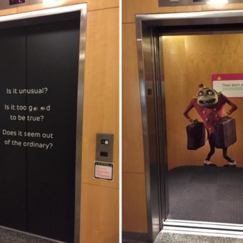 An elevator door and elevator wall with graphics