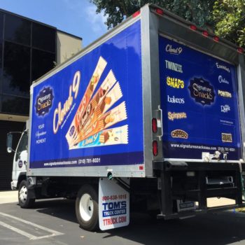 A box truck wrapped for a snack company