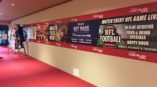 A wall mural for Lucky Lady Casino with advertisements for food and NFL football