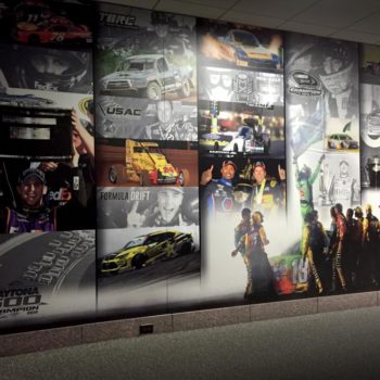 A wall mural for various different car and truck races