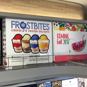 Indoor sign for Frostbites location that is coming soon