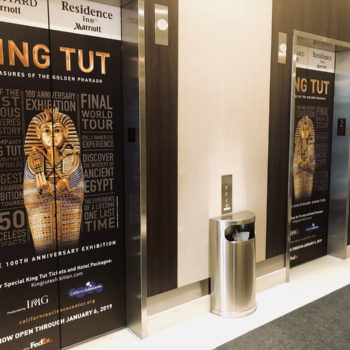 Wrapped elevators at a Marriott Inn advertising a King Tut exhibit at the California Science Center