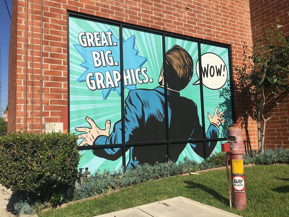 Window graphic of a man shocked by Big Graphics