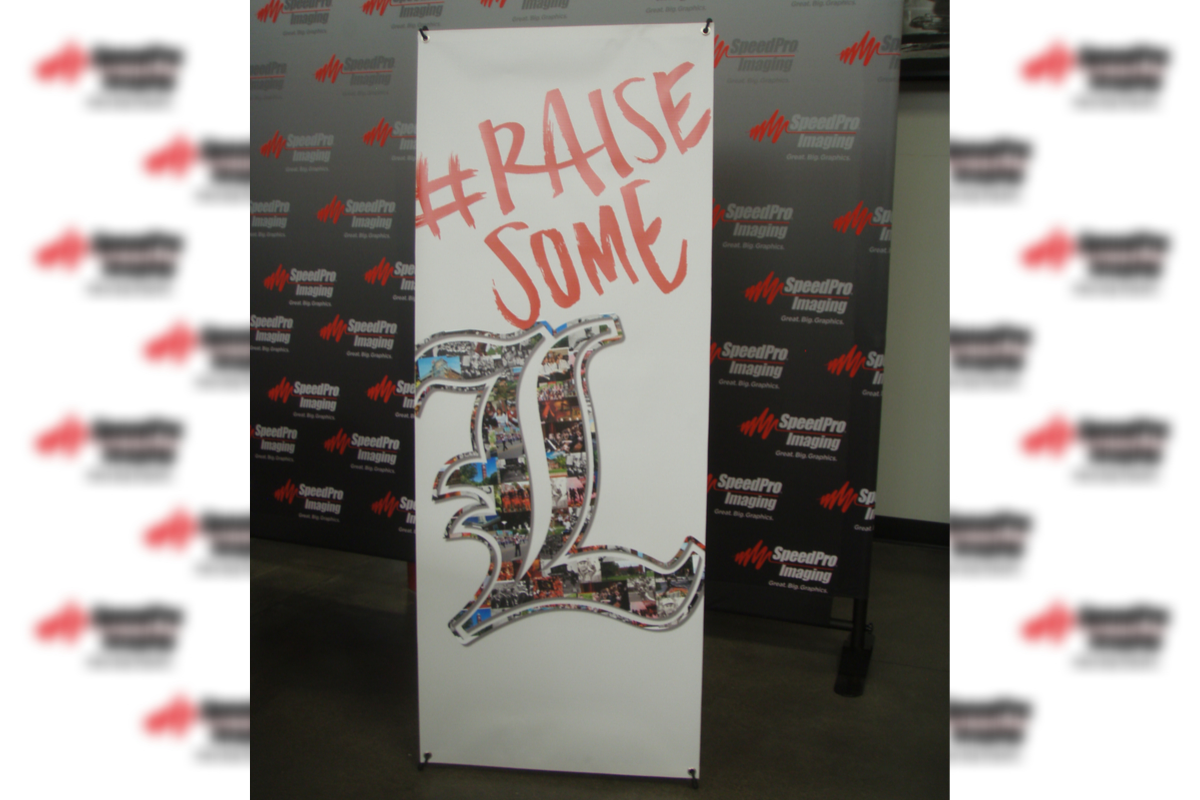#raisesome standing banner