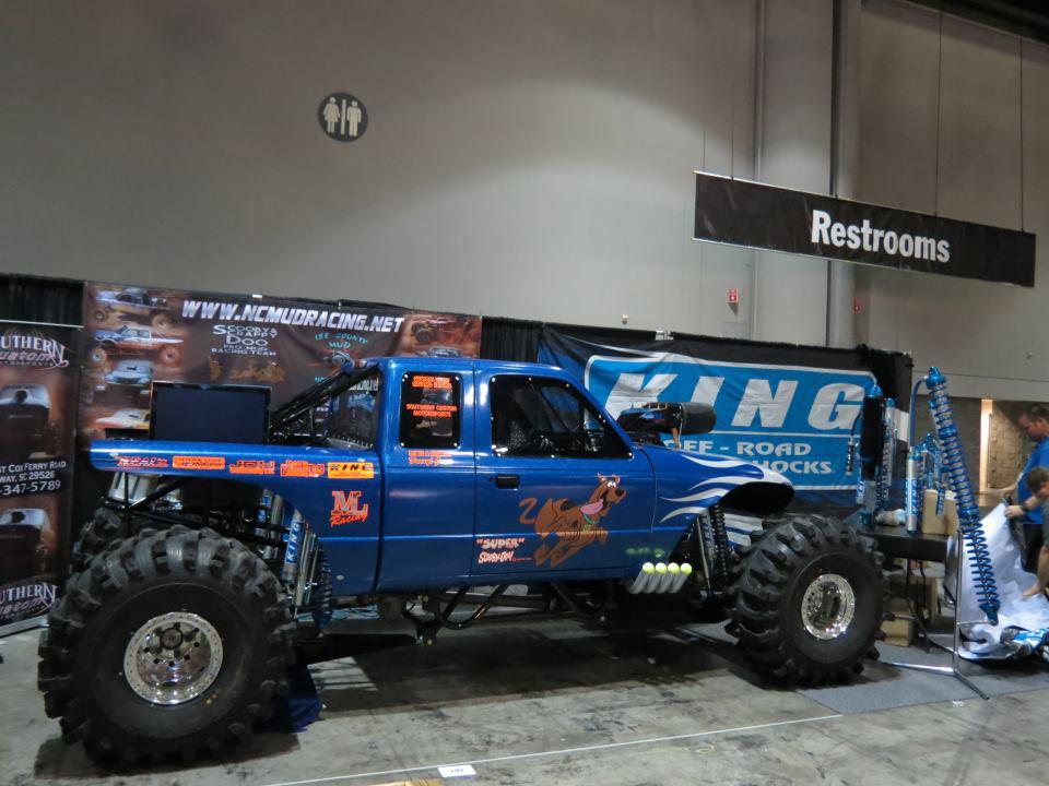 Custom vehicle decals placed on a blue monster truck