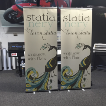 Two banners featuring a peacock for Statianery by Loren Statia 