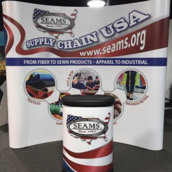 Tradeshow display for the National Association of Seams featuring a podium and screen