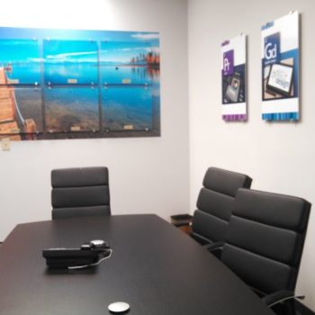 Conference room picture frames and wall design