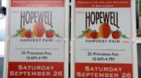 2 outdoor signs for the Hopewell Harvest Fair with 4 pumpkins on each