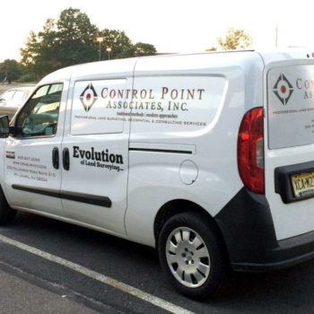 Vehicle wrap on white van for Control Point Associates, Inc.