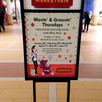 Indoor sign advertising the Market Fair and its dates