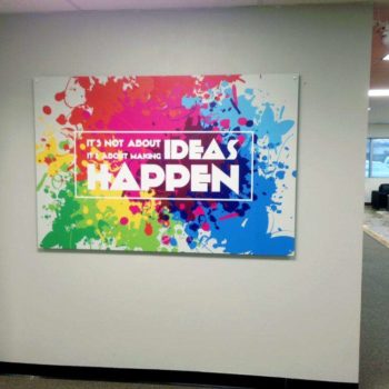 A colorful indoor graphic with a motivational quote.