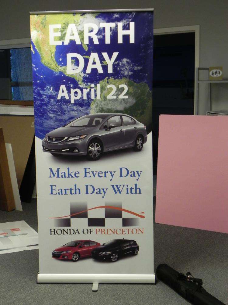 Banner advertisement for Earth Day by the Honda of Princeton 