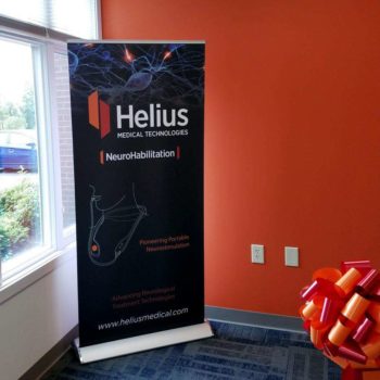 Banner sign for Helius Medical Technologies