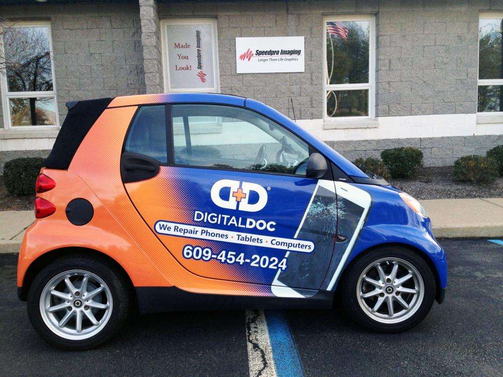 Vehicle wrap on small car for Digital Doc.