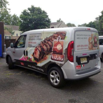 Vehicle wrap with food images and logo for Vidalia italian restaurant.