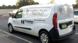 Vehicle lettering on white van for Control Point Associates, Inc.
