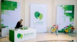 A trade show display including banners and table toppers for doubleclick