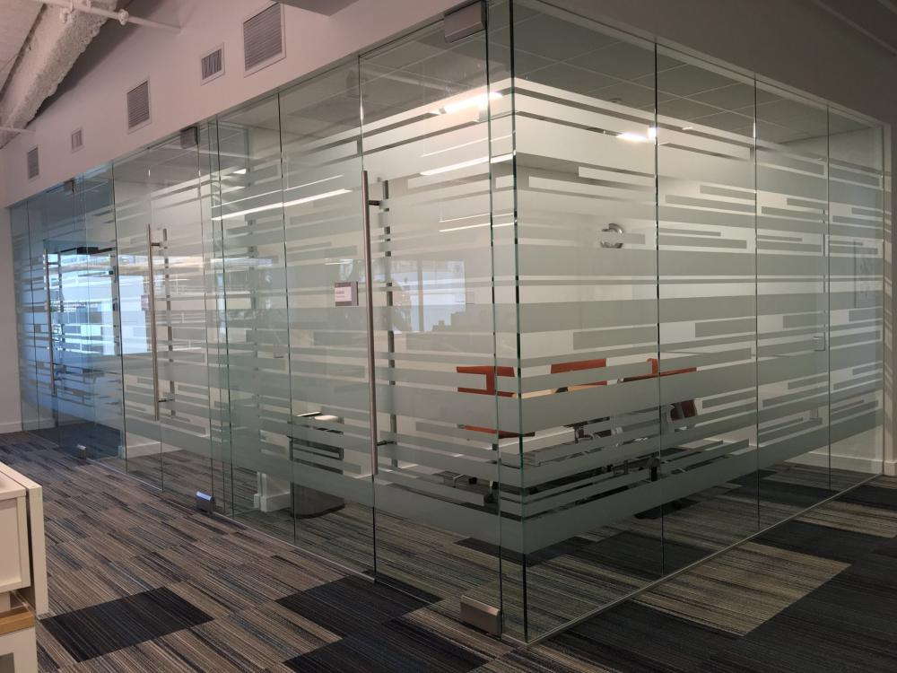 A glass finish surrounding an office space