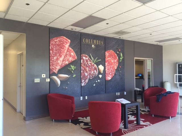 An installed wall graphic for Columbus meats