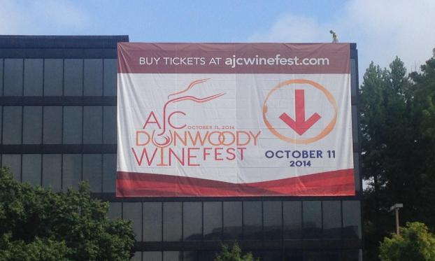 AJC Winefest outdoor banner hanging on a building