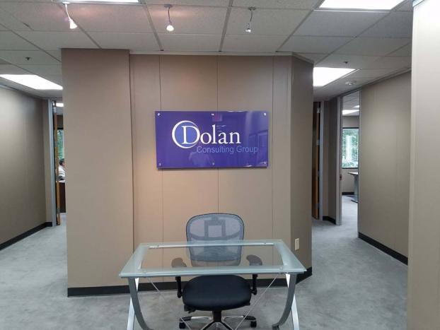 Dolan Consulting Group indoor glass wall signage
