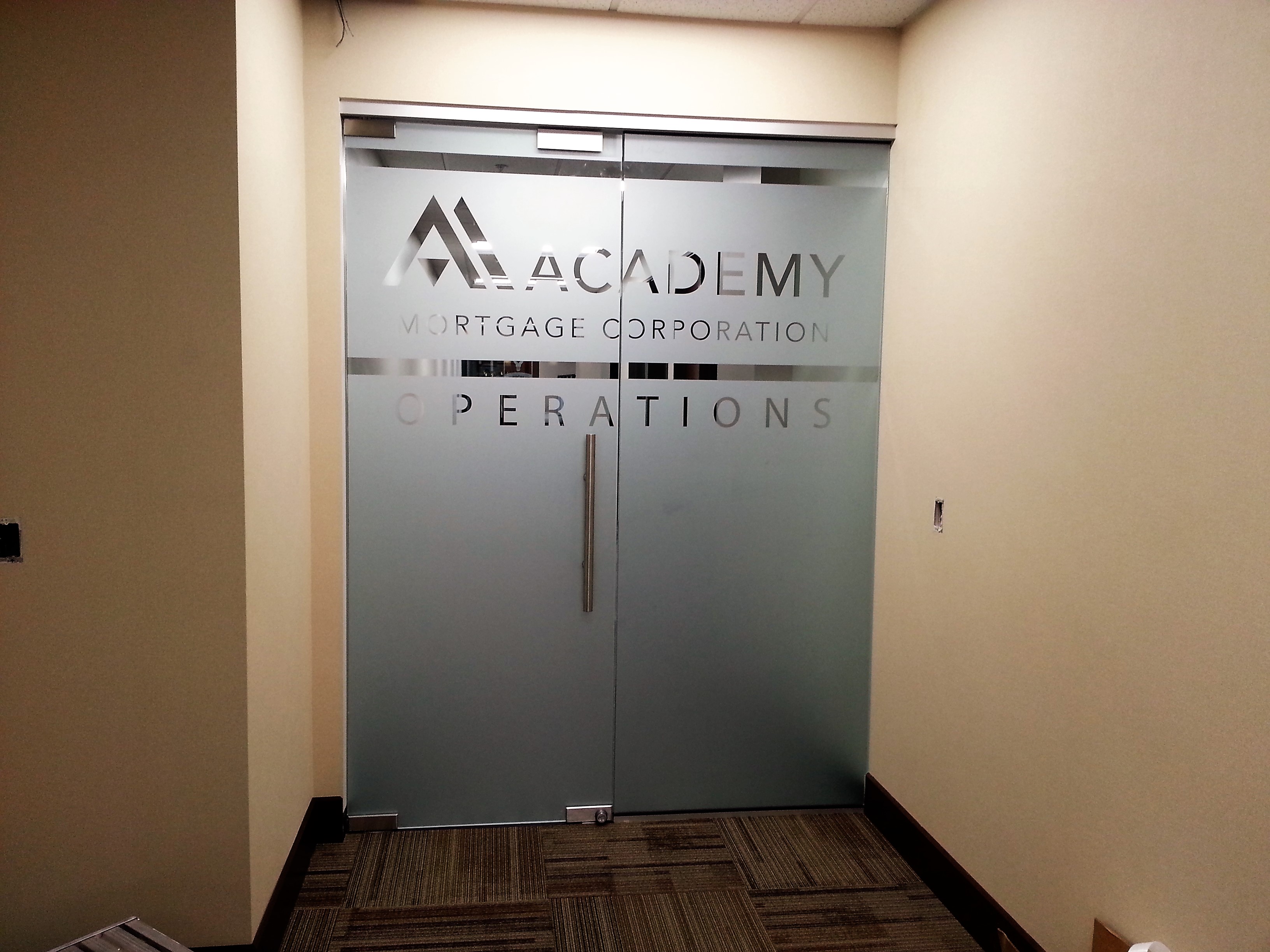 Academy Mortage Corporation door graphic for operations