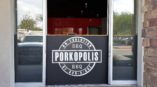 Porkopolis BBQ entrance door graphic