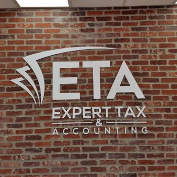 Expert Tact and Accounting signage