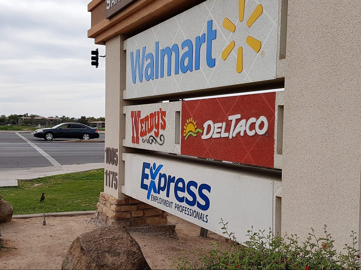 Monument panel inserts can be switched out and let customers know what businesses operate in a plaza