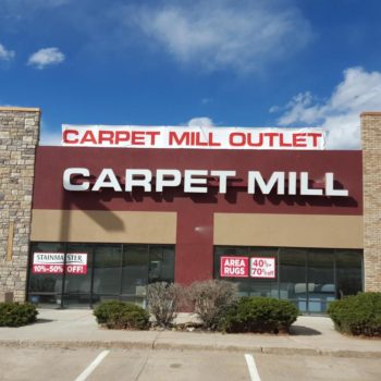 Carpet Mill Outlet banner and sale signage