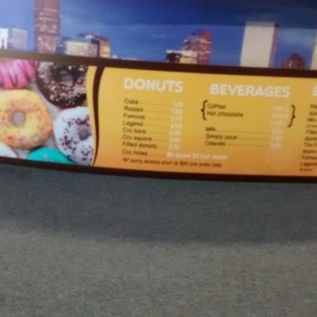 The Donut House menu sign