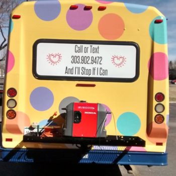 Lula Roe graphic bus wrap back of bus