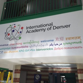International Academy of Denver welcome signage in multiple languages
