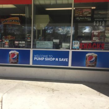 Pepsi window graphic advertisement at convenience store