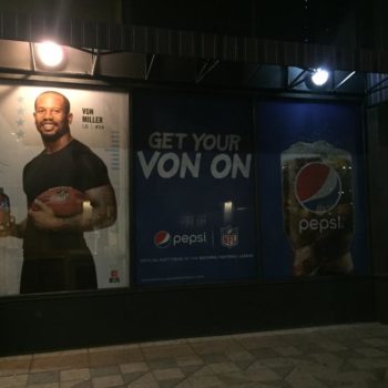 Pepsi soda window graphic advertisement with Von Miller
