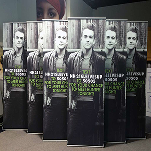 Hunter Hayes standing banner text