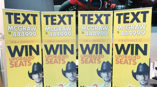 Tim McGraw standing banner text