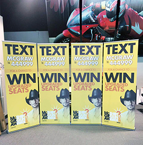 Tim McGraw standing banner text