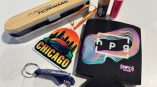 picture of promotional gift items with logos, sitting on a table