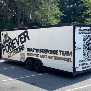 Forever Exteriors Larger Trailer with custom cut graphics and QR code installed
