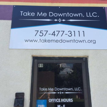 Take Me Downtown outdoor signage