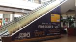ABNB escalator wrap