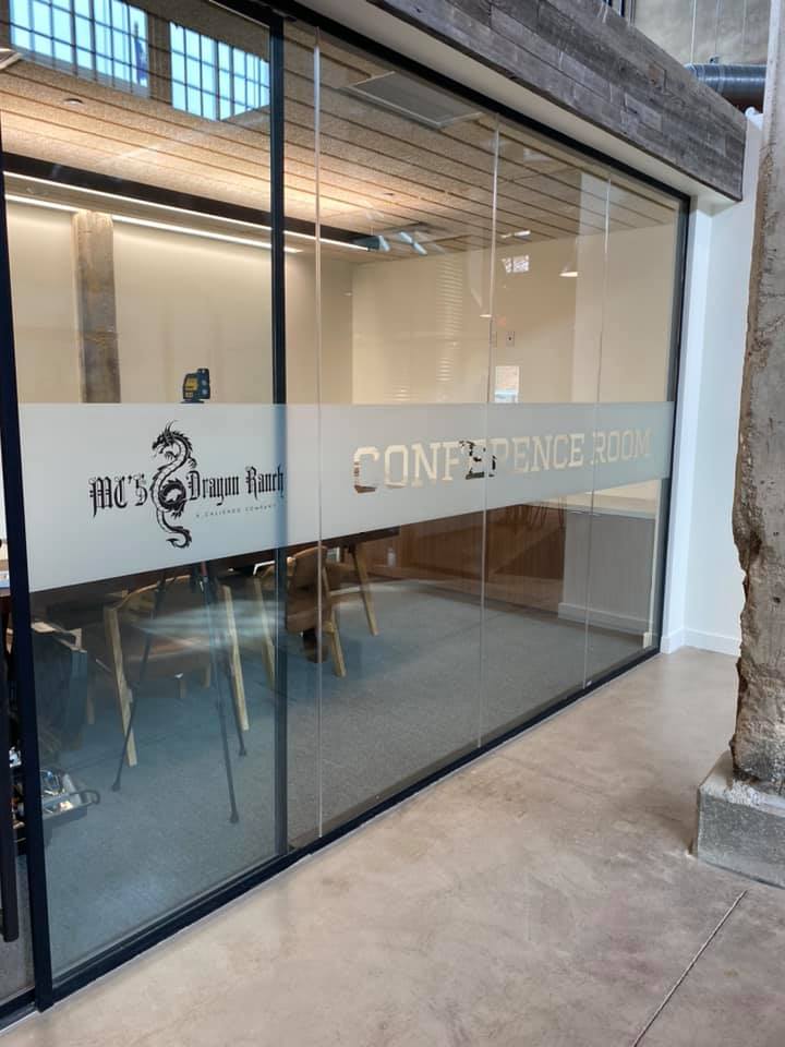 Frosted window graphics with composite material and glass design