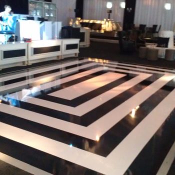 Event space with black and white patterned dancefloor 