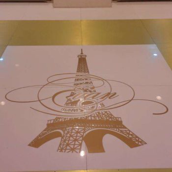 floor graphic with Eiffel Tower and last name 