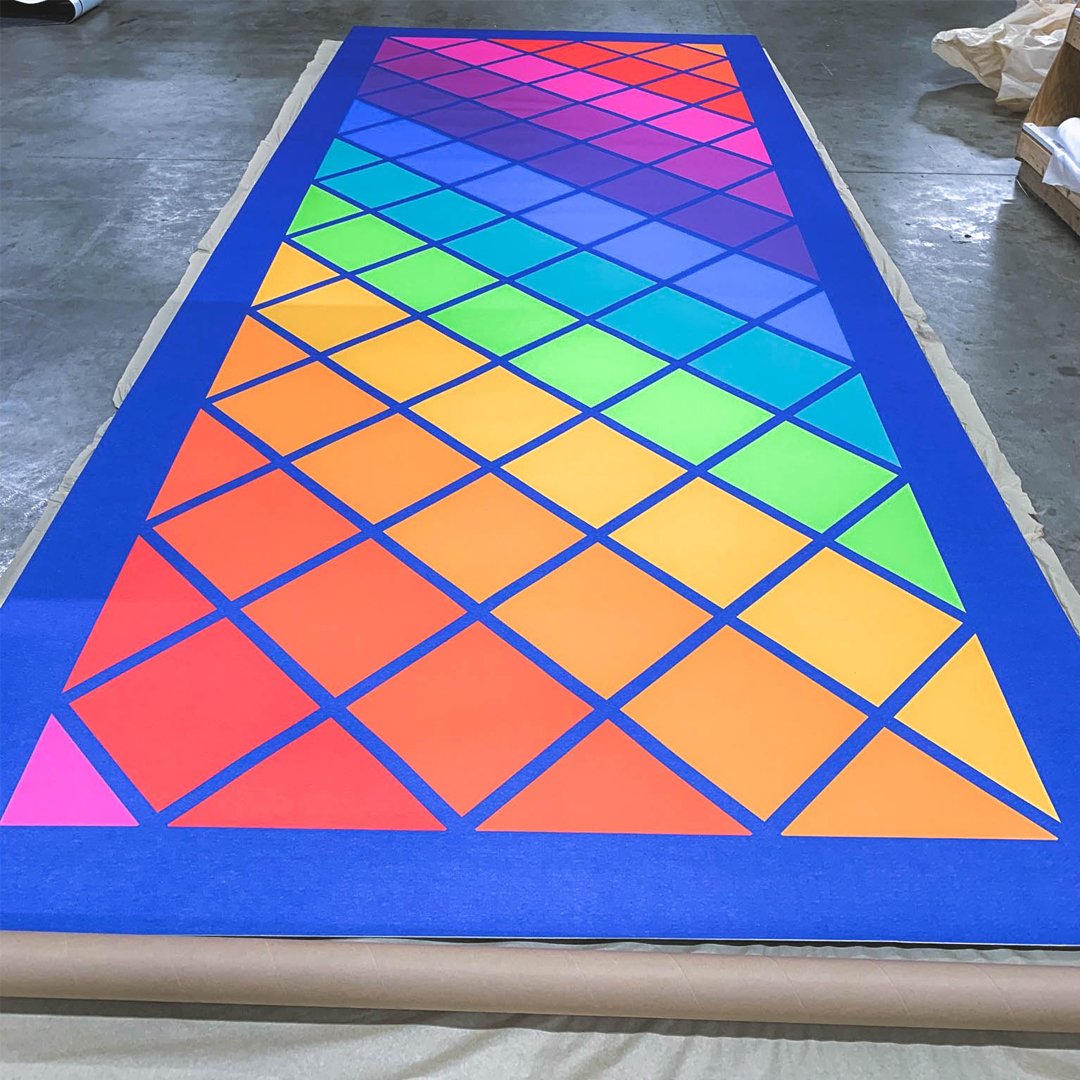 Vibrant rainbow grid with colorful geometric pattern showcasing vivid hues